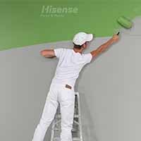 Green Hisense Oil Plaint painter is rolling on the wall