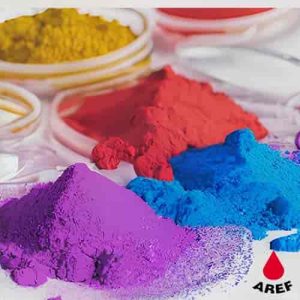 pigment powder in purple, yellow, blue and red colors